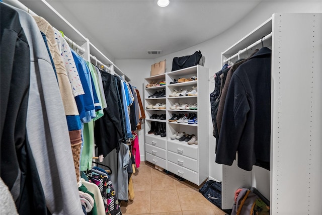 8519 Rebawood Dr, Humble, TX 77346 - walk in closet with light tile patterned flooring