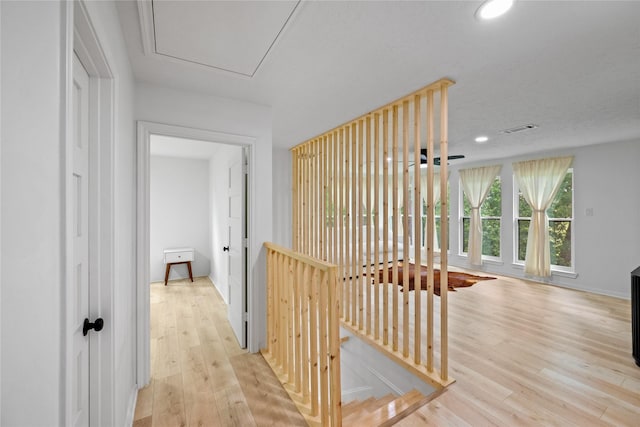 8519 Rebawood Dr, Humble, TX 77346 - hallway with wood finished floors and recessed lighting
