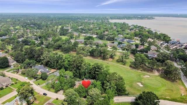 8519 Rebawood Dr, Humble, TX 77346 - aerial view of property and surrounding area with nearby suburban area, a large body of water, and a golf club
