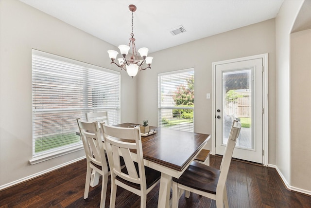 1402 Sullivan Springs Dr, Katy, TX 77494 - dining space with a chandelier and wood-type flooring