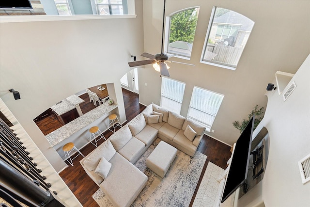 1402 Sullivan Springs Dr, Katy, TX 77494 - living room with a high ceiling, wood finished floors, and a ceiling fan