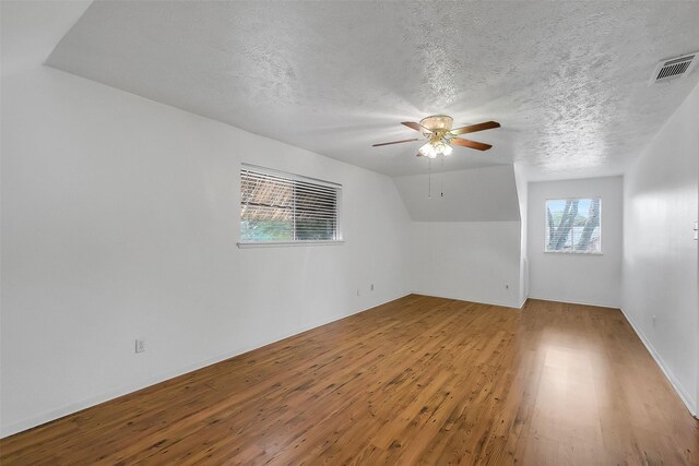 21307 Park Willow Dr, Katy, TX 77450 - bonus room featuring ceiling fan, wood finished floors, and a textured ceiling