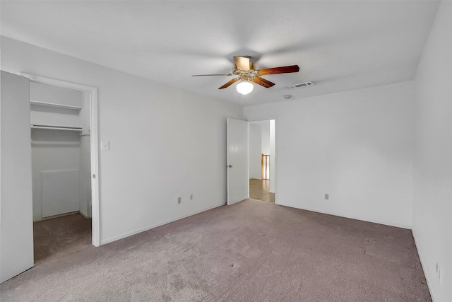 21307 Park Willow Dr, Katy, TX 77450 - unfurnished bedroom with carpet flooring, a spacious closet, a ceiling fan, and a closet