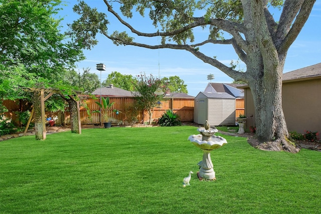 21307 Park Willow Dr, Katy, TX 77450 - fenced backyard featuring a storage unit