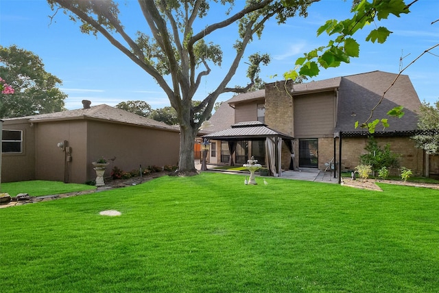 21307 Park Willow Dr, Katy, TX 77450 - rear view of house with a gazebo, a patio area, and a yard