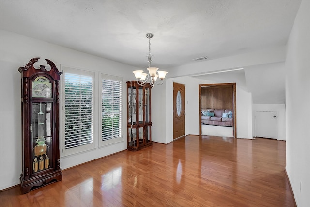 21307 Park Willow Dr, Katy, TX 77450 - unfurnished dining area with a chandelier and wood finished floors