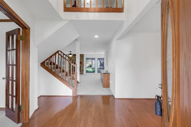 21307 Park Willow Dr, Katy, TX 77450 - foyer with wood finished floors, stairway, ceiling fan, and recessed lighting