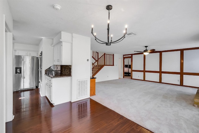 21307 Park Willow Dr, Katy, TX 77450 - kitchen featuring stainless steel appliances, ceiling fan, a chandelier, dark wood-style flooring, and white cabinets