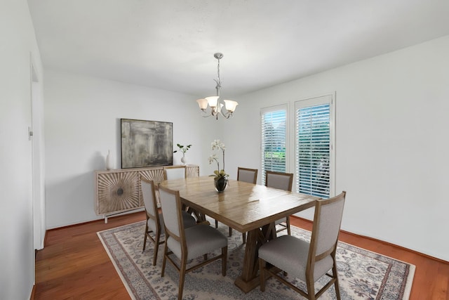 21307 Park Willow Dr, Katy, TX 77450 - dining area with a chandelier and wood finished floors