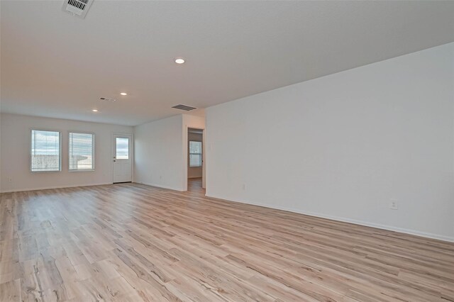 22156 Juniper Crossing Dr, New Caney, TX 77357 - unfurnished room featuring light wood-style floors and recessed lighting