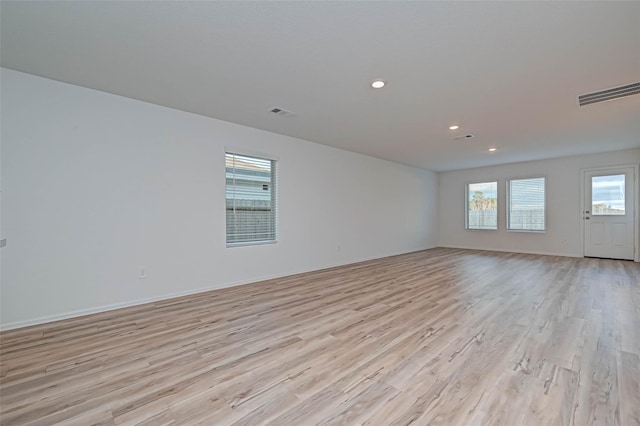 22156 Juniper Crossing Dr, New Caney, TX 77357 - empty room featuring recessed lighting and light wood finished floors