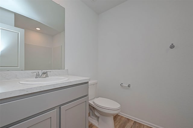 22156 Juniper Crossing Dr, New Caney, TX 77357 - bathroom featuring wood finished floors and vanity