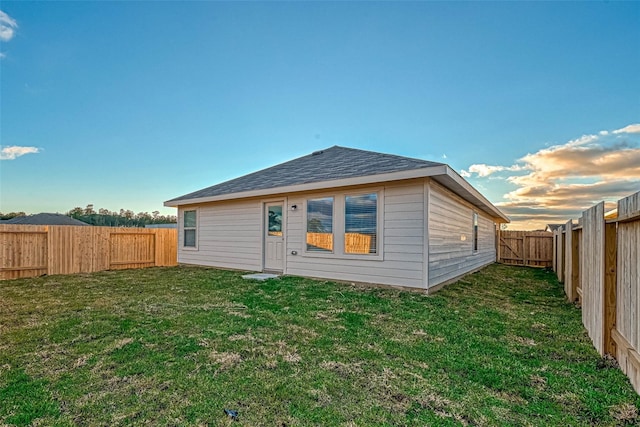 22156 Juniper Crossing Dr, New Caney, TX 77357 - rear view of house featuring a fenced backyard and a shingled roof