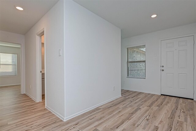 22156 Juniper Crossing Dr, New Caney, TX 77357 - entryway featuring light wood-style floors and recessed lighting