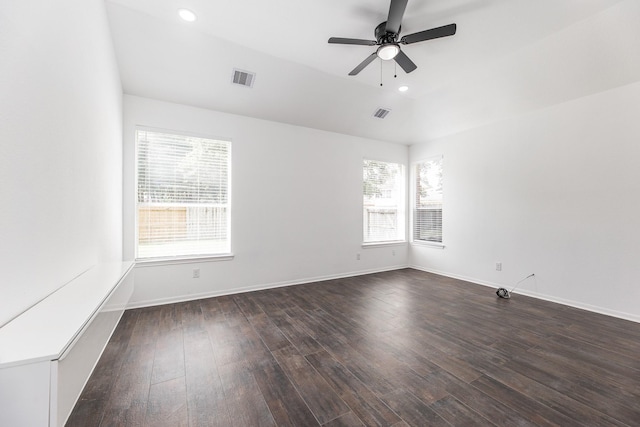 20411 Avery Point Dr, Katy, TX 77449 - empty room with healthy amount of natural light, a ceiling fan, dark wood finished floors, and recessed lighting