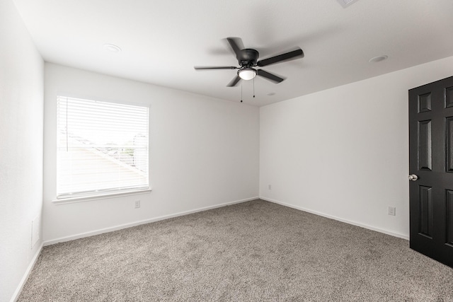20411 Avery Point Dr, Katy, TX 77449 - carpeted empty room with a ceiling fan and baseboards