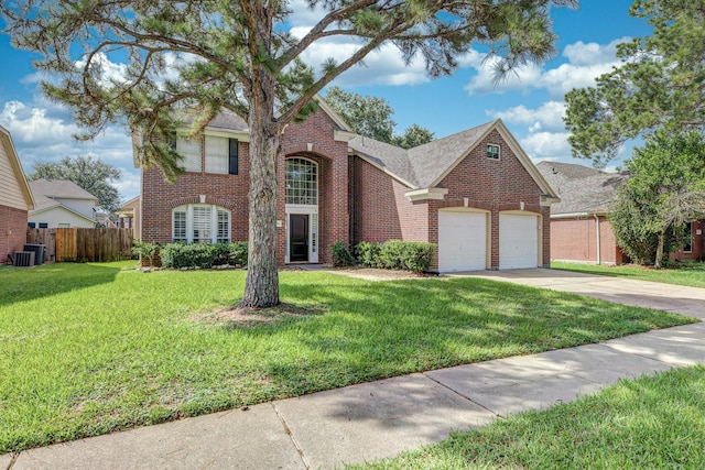 20411 Avery Point Dr, Katy, TX 77449 - traditional-style home with brick siding, driveway, and a garage
