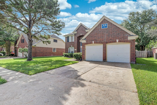 20411 Avery Point Dr, Katy, TX 77449 - traditional-style house featuring brick siding, concrete driveway, and a garage