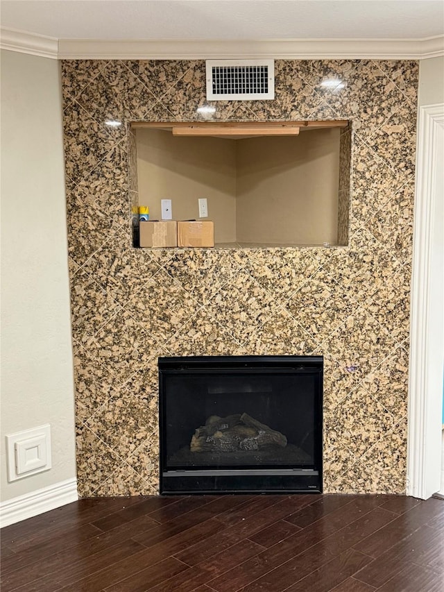2330 Lakewood Yacht Club Dr Unit 7, Seabrook, TX 77586 - detailed view of a fireplace, crown molding, and wood finished floors