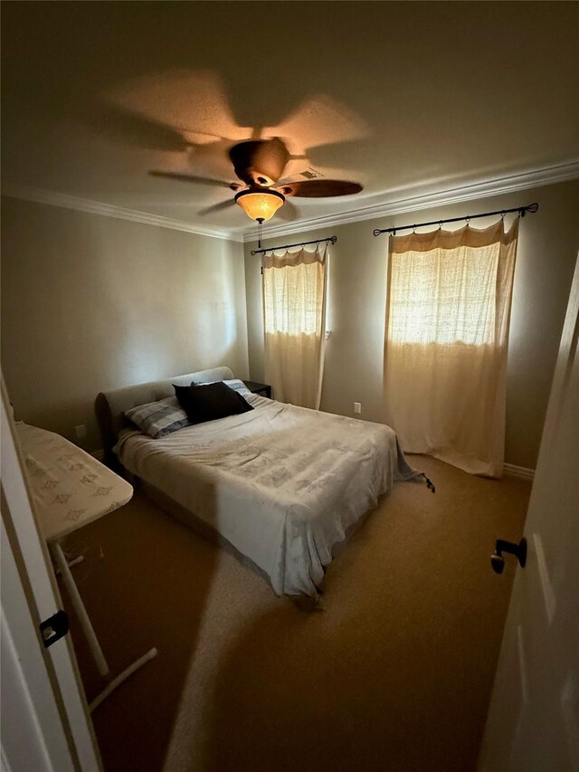 2330 Lakewood Yacht Club Dr Unit 7, Seabrook, TX 77586 - carpeted bedroom featuring crown molding and a ceiling fan