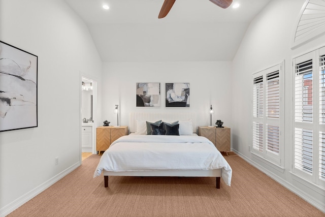 817 Rosine St, Houston, TX 77019 - bedroom featuring lofted ceiling, light colored carpet, multiple windows, connected bathroom, and a ceiling fan