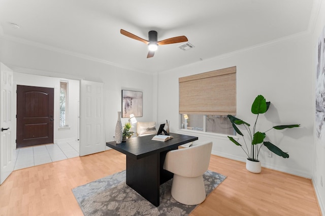 817 Rosine St, Houston, TX 77019 - home office featuring light wood-style floors, a ceiling fan, and crown molding