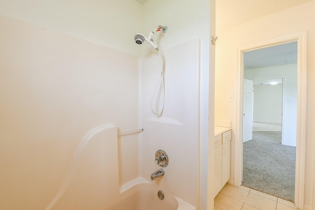 1117 Delores St, Kemah, TX 77565 - full bathroom featuring tile patterned flooring, shower / washtub combination, and vanity