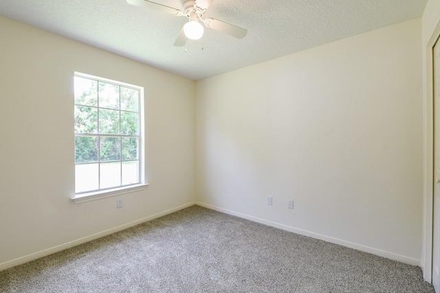 1117 Delores St, Kemah, TX 77565 - carpeted spare room with a ceiling fan and a textured ceiling