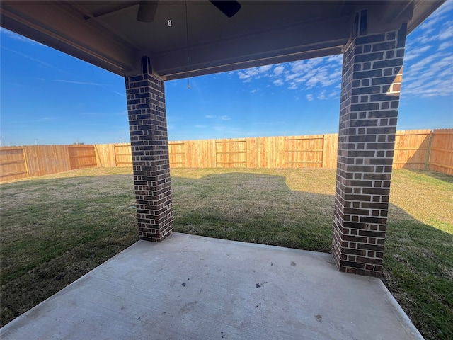 3118 Banyan Dr, Texas City, TX 77510 - fenced backyard featuring a ceiling fan and a patio