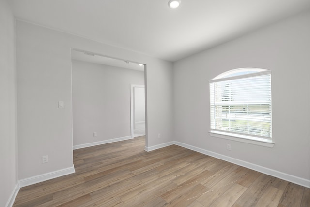 3118 Banyan Dr, Texas City, TX 77510 - empty room featuring light wood-style flooring and baseboards