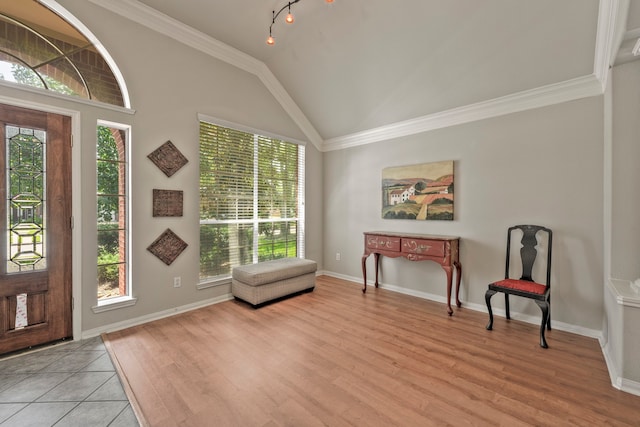 13615 Mierwood Manor Dr, Cypress, TX 77429 - foyer featuring light wood finished floors, vaulted ceiling, and ornamental molding