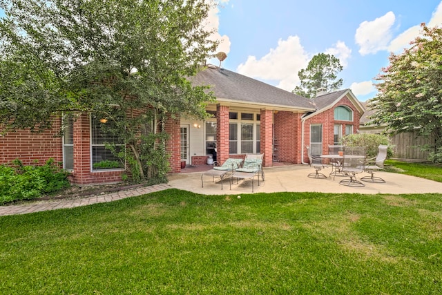 13615 Mierwood Manor Dr, Cypress, TX 77429 - back of property with brick siding and a patio area