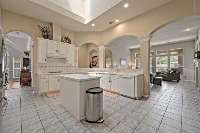 13615 Mierwood Manor Dr, Cypress, TX 77429 - kitchen featuring white dishwasher, cooktop, light countertops, recessed lighting, and decorative backsplash