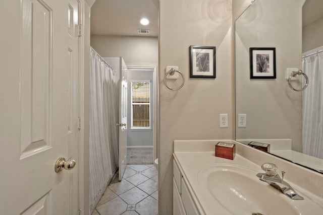 13615 Mierwood Manor Dr, Cypress, TX 77429 - bathroom with tile patterned floors and vanity
