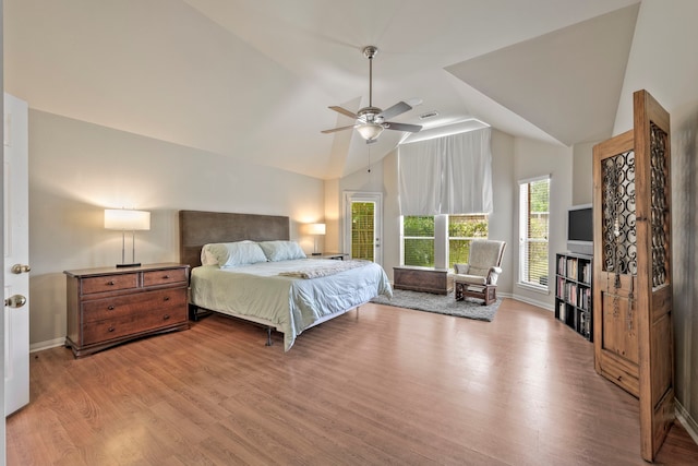 13615 Mierwood Manor Dr, Cypress, TX 77429 - bedroom featuring wood finished floors, lofted ceiling, and a ceiling fan