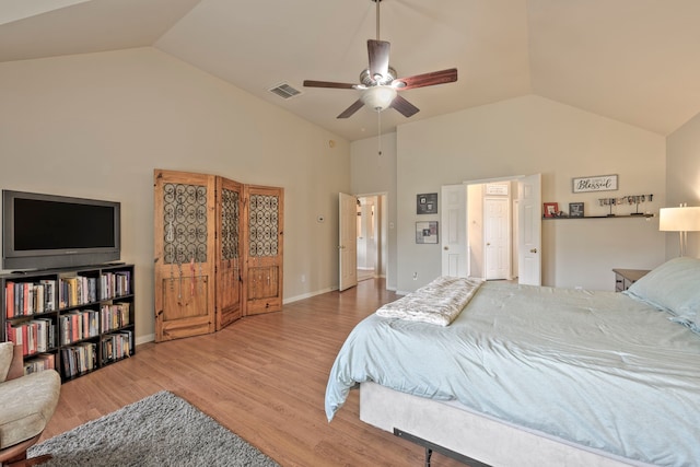 13615 Mierwood Manor Dr, Cypress, TX 77429 - bedroom with wood finished floors, high vaulted ceiling, and a ceiling fan