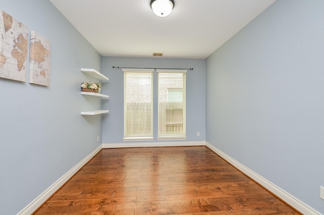 28722 Maple Red Dr, Katy, TX 77494 - empty room featuring wood finished floors