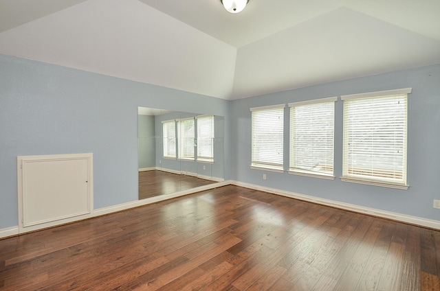 28722 Maple Red Dr, Katy, TX 77494 - spare room with lofted ceiling and hardwood / wood-style floors
