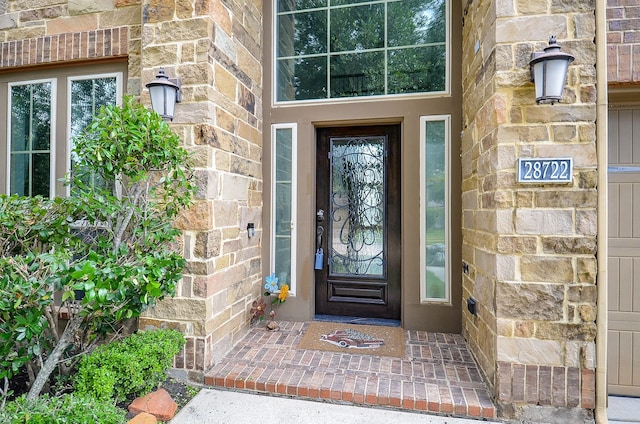 28722 Maple Red Dr, Katy, TX 77494 - property entrance with stone siding
