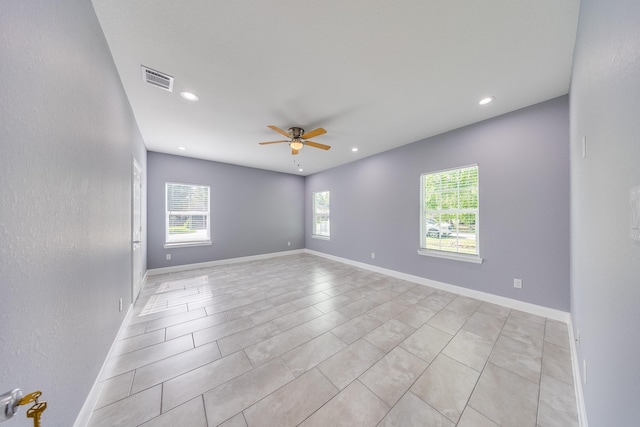 5402 Oriole St, Houston, TX 77017 - empty room featuring a ceiling fan, recessed lighting, and light tile patterned floors