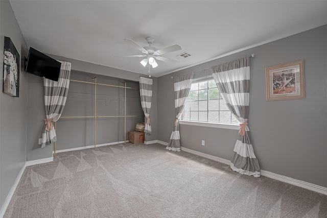 15610 Township Glen Ln, Cypress, TX 77433 - carpeted empty room with ceiling fan and baseboards