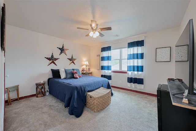 15610 Township Glen Ln, Cypress, TX 77433 - carpeted bedroom featuring baseboards and ceiling fan