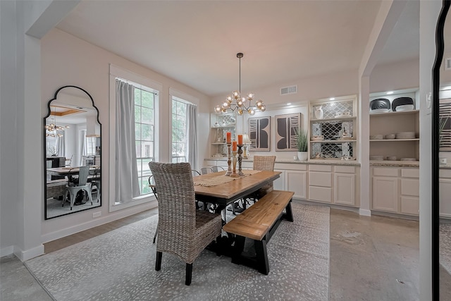 15610 Township Glen Ln, Cypress, TX 77433 - dining room featuring a chandelier and finished concrete floors
