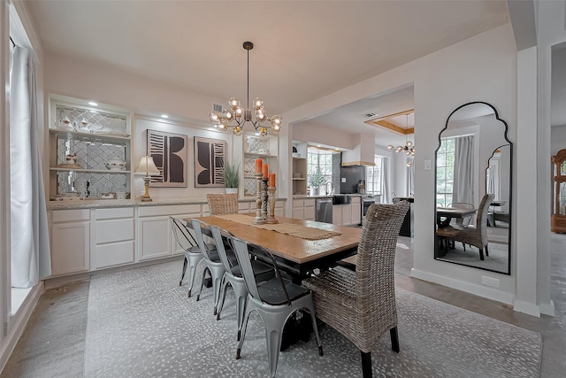 15610 Township Glen Ln, Cypress, TX 77433 - dining space with a chandelier and baseboards