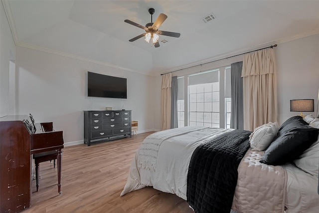 15610 Township Glen Ln, Cypress, TX 77433 - bedroom with light wood-style flooring, ornamental molding, a raised ceiling, and a ceiling fan