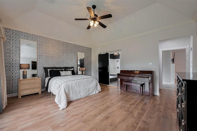15610 Township Glen Ln, Cypress, TX 77433 - bedroom featuring a tray ceiling, ornamental molding, light wood-style flooring, and a ceiling fan