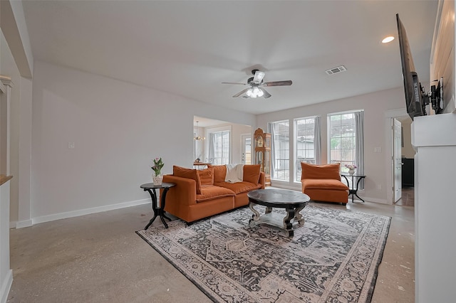 15610 Township Glen Ln, Cypress, TX 77433 - living room featuring a ceiling fan and concrete flooring