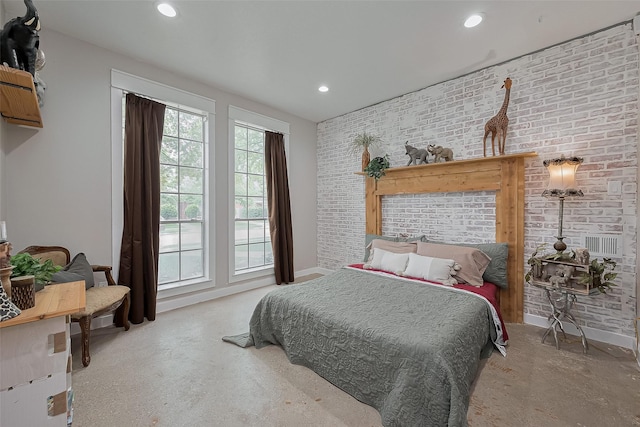 15610 Township Glen Ln, Cypress, TX 77433 - bedroom featuring recessed lighting and brick wall