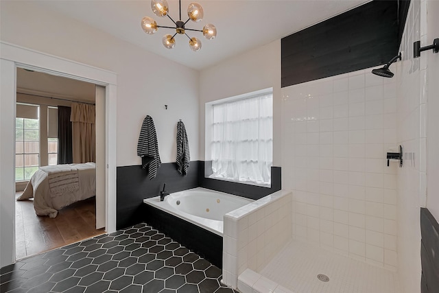15610 Township Glen Ln, Cypress, TX 77433 - ensuite bathroom featuring a jetted tub, a chandelier, tiled shower, and tile patterned flooring