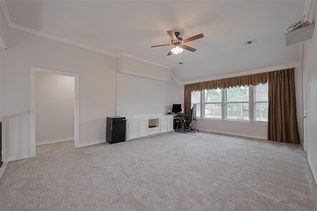 15610 Township Glen Ln, Cypress, TX 77433 - unfurnished living room with an office area, a ceiling fan, vaulted ceiling, light colored carpet, and crown molding